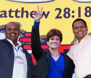 00-Leaders-in-front-of-stage-banner-2020-Conf-2014-Alok-David-Leanna-1200web-1